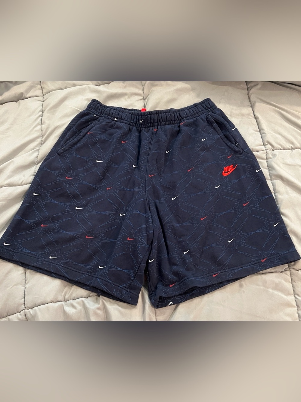 Nike Men's Navy Blue Athletic Shorts with Red and White Swoosh Accents XXL